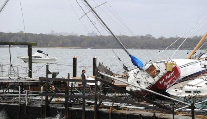 A man surveys the damage after Hurricane Sandy ©  SW